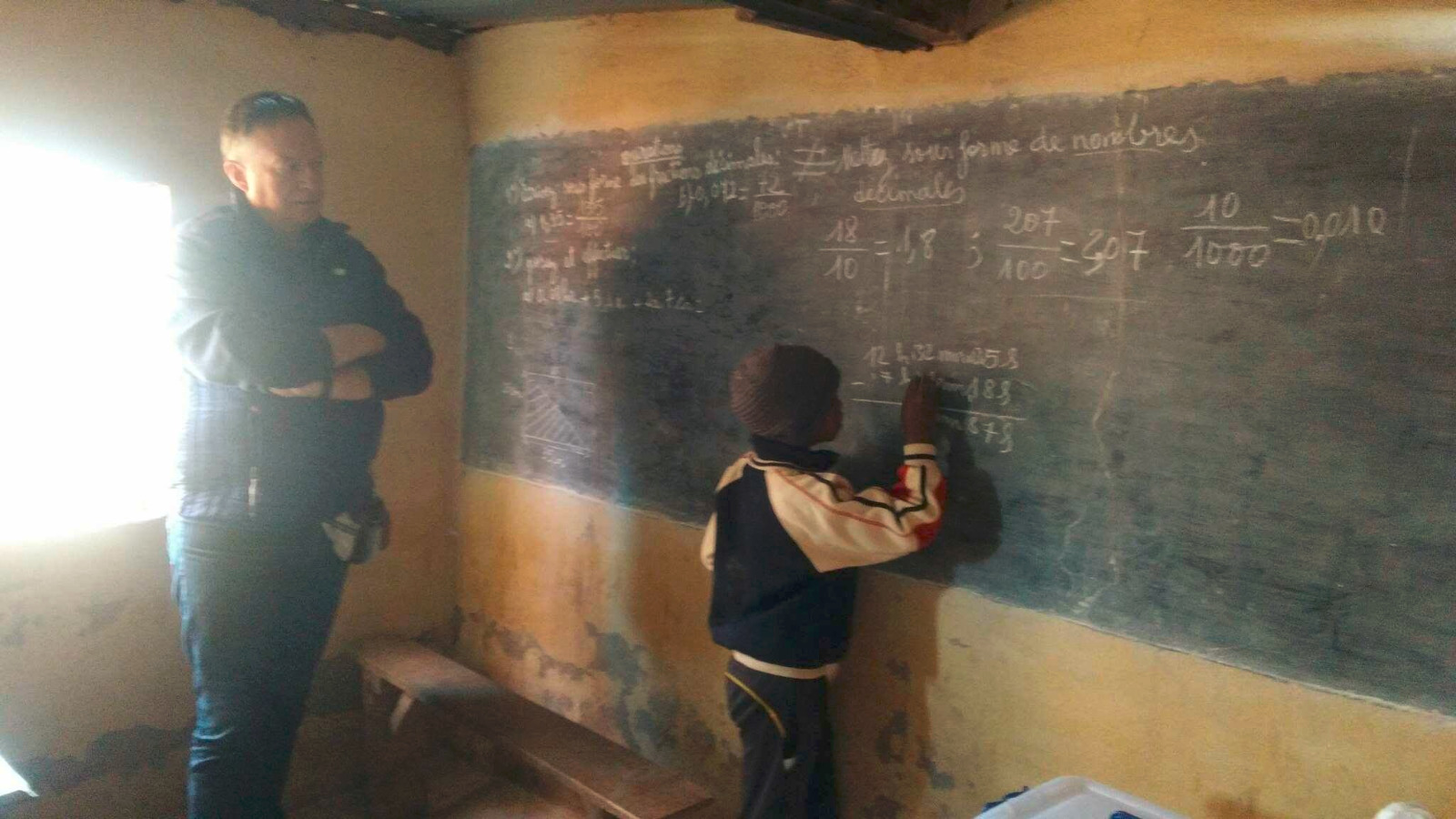 Photo 23 — enfants et équipe de Kilonga Tafita sur le terrain